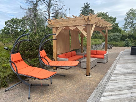 Truro Cape Cod vacation rental - Pergola with swing chairs.  Provides great shade in the afternoon