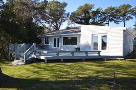 Eastham Cape Cod vacation rental - Freshly painted deck, new grass and plantings.