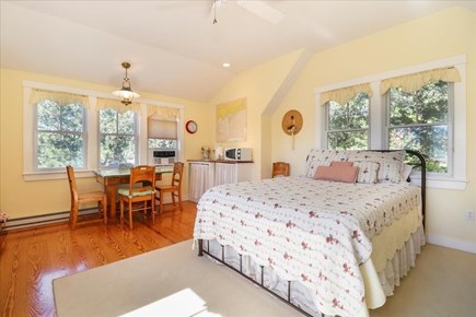 Hyannis Cape Cod vacation rental - Carriage house bedroom with queen bed and ensuite bath