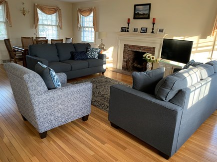 Falmouth Village Cape Cod vacation rental - Living Room / Dining Area - brand new couches! Lots of room.