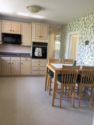 Falmouth Village Cape Cod vacation rental - Kitchen has an eat-in tall table in addition to main dining table