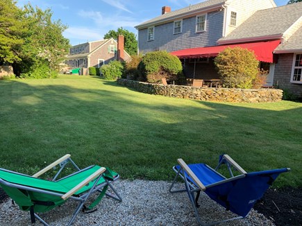 Falmouth Village Cape Cod vacation rental - Large, private backyard for fun! Wiffle ball? (Firepit not shown)