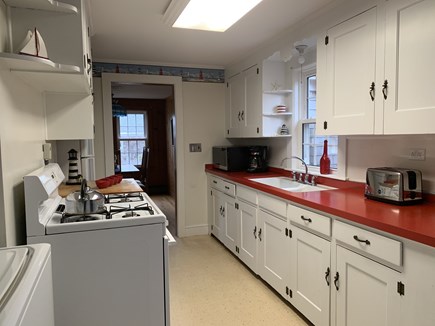 Chatham Cape Cod vacation rental - Galley Kitchen with dishwasher, microwave & gas stove/oven