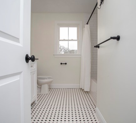 Onset MA vacation rental - Second Floor Bathroom, with view out the window.
