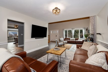 Dennis Port Cape Cod vacation rental - Large open living room space with fireplace and Flat screen TV