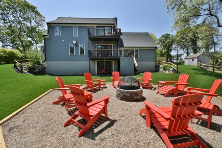 Dennis Port Cape Cod vacation rental - Large, lush yard build to lounge.