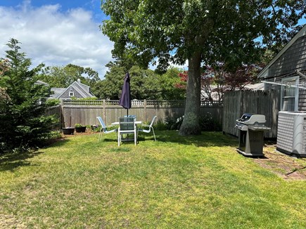 West Harwich Cape Cod vacation rental - Outdoor table, outdoor shower and gas grill