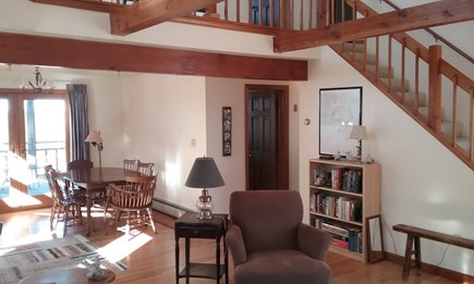 Wellfleet Cape Cod vacation rental - Living room with views, stairs to loft for sleeping & TV