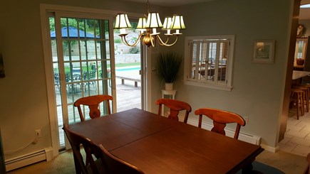 Chatham Cape Cod vacation rental - Dining area with sliders to deck and pool area
