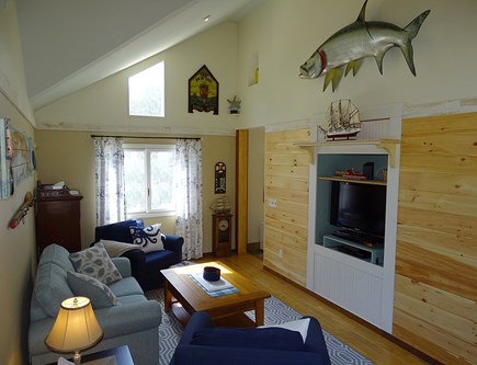 Bass River, South Yarmouth Cape Cod vacation rental - Vaulted family room with TV, slider to deck