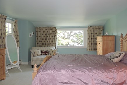 Harwich Cape Cod vacation rental - Bedroom 4 with queen size bed looks toward pond