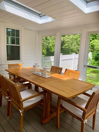 Dennis - Mayflower Beach Cape Cod vacation rental - Screened Porch with Seating for Eight