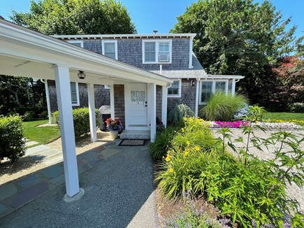 Chatham Cape Cod vacation rental - Side entrace to home with gas grill in back yard