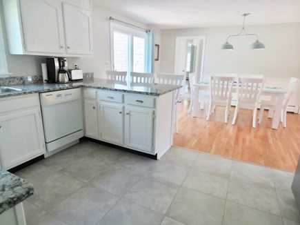 Brewster Cape Cod vacation rental - This shows how the kitchen and dining area are situated.