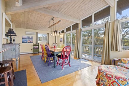 Eastham Cape Cod vacation rental - Dining area with wrap-around deck