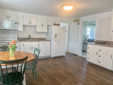 Harwich Port  Cape Cod vacation rental - Open bright kitchen area with cozy dining area.