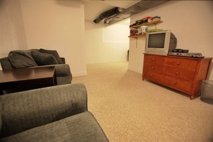 Wellfleet Cape Cod vacation rental - Downstairs TV Area with Chair Sofa Beds