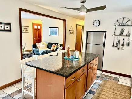 Eastham Cape Cod vacation rental - Kitchen Island and LR