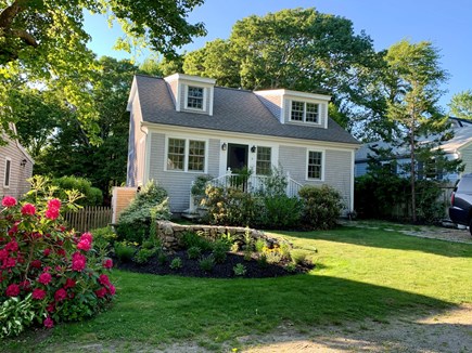 Marion MA vacation rental - Front view of home with professionally landscaped garden