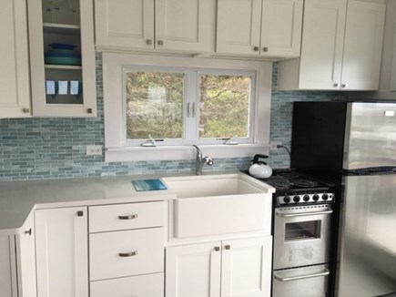 Wellfleet Oceanfront Home Cape Cod vacation rental - Kitchen with New Cabinets &tile & stainless steel appliances