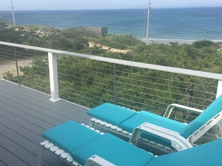 Wellfleet Oceanfront Home Cape Cod vacation rental - Master BR Deck w Lounges overlooking Ocean
