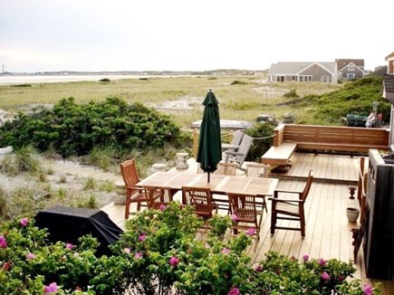 North Truro Cape Cod vacation rental - View of the deck in the direction of Provincetown.