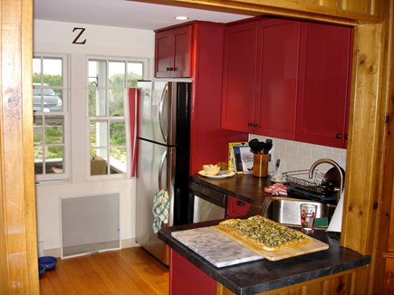 North Truro Cape Cod vacation rental - Kitchen that opens to the dining room.