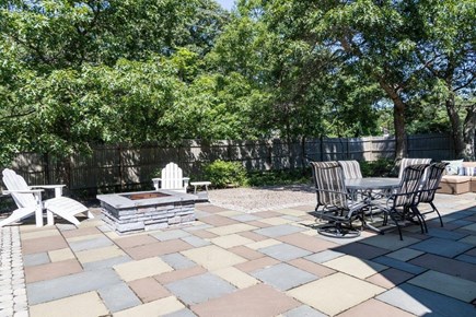 Harwich Cape Cod vacation rental - Private back yard with BBQ grill, fire pit and outdoor shower