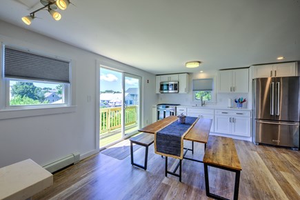 Sandwich Cape Cod vacation rental - Dining area opens to upper level deck