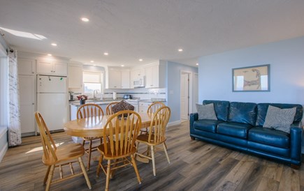 East Sandwich Cape Cod vacation rental - Dining with seating for six guests  and living room.