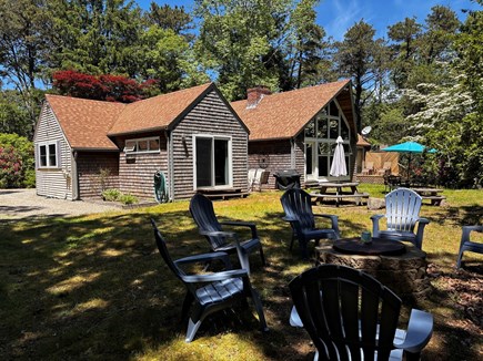 Brewster Cape Cod vacation rental - Private backyard. Ample seating, weber grill, and firepit.