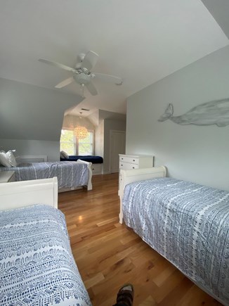 Harwichport Cape Cod vacation rental - Bedroom #2.  3 Twins, Window seat bed and two extra mattresses