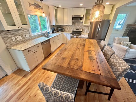 Harwichport Cape Cod vacation rental - Kitchen with custom hand reclaimed wood island.