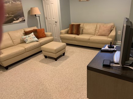 Falmouth Cape Cod vacation rental - Basement sitting room with 2 full sofas and tv