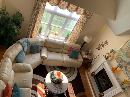 Falmouth Cape Cod vacation rental - Cozy and inviting family room with gas fireplace and 65 inch tv