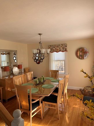 Falmouth Cape Cod vacation rental - Bright and sunny dining room with seating for 8.