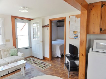 Wellfleet Cape Cod vacation rental - Front door to left with bedroom to right from dining area