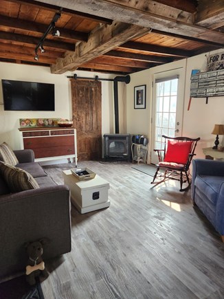 Plymouth, White Horse Beach MA vacation rental - Livingroom with Qn sleep sofa and back door to outside dining