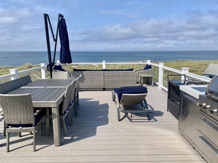 Truro Cape Cod vacation rental - Seating area and grill with views of Cape Cod bay