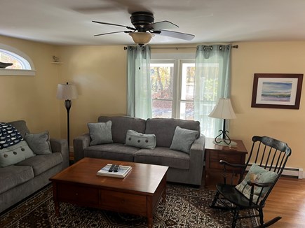 North Eastham Cape Cod vacation rental - LR with new, comfortable sofa and loveseat, game table, smart TV