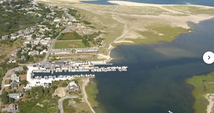 Chatham; Chatham Oceanfront Co Cape Cod vacation rental - Arial view from Outermost Harbor Marina side at high tide.