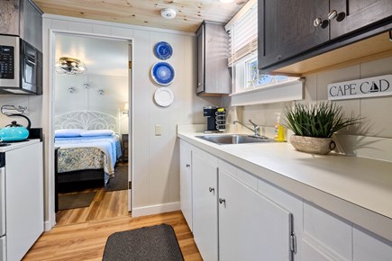 Dennis Port Cape Cod vacation rental - Kitchen overlooking front deck and yard