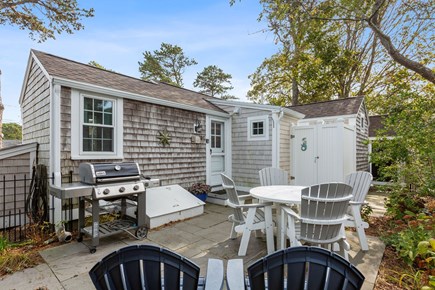 Dennis Port Cape Cod vacation rental - Back patio with fence (seen at left)