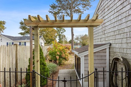 Dennis Port Cape Cod vacation rental - Beautiful archway from back patio to front yard