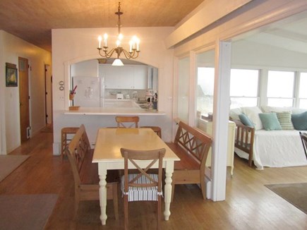 Wellfleet Cape Cod vacation rental - Dining table off of kitchen is open to the Living  Room & Sunroom