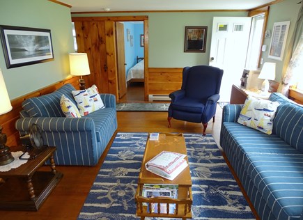 Dennis Cape Cod vacation rental - Sunny living room, showing entrance to bedrooms