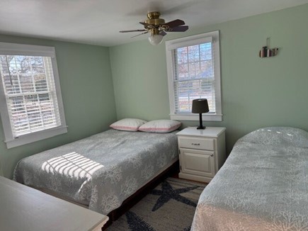 South Yarmouth Cape Cod vacation rental - 2nd bedroom - Queen and twin bed - TV mounted on wall