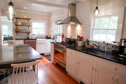 Brewster Cape Cod vacation rental - Open kitchen leading to dining area and living room