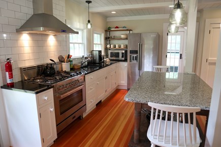 Brewster Cape Cod vacation rental - The back yard is located just off the kitchen