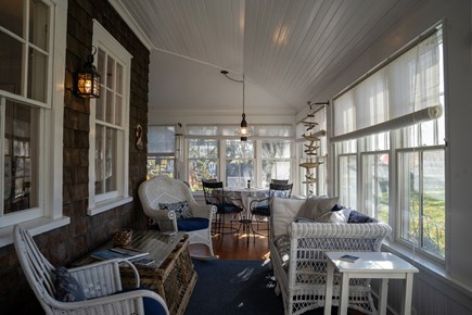 Harwich Port  Cape Cod vacation rental - Porch sitting room and dinning table